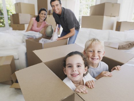 Packed boxes and furniture prepared for a house move in Finsbury Park