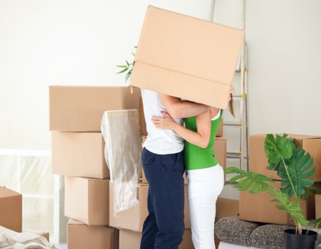Local movers handling furniture in a Finsbury Park flat
