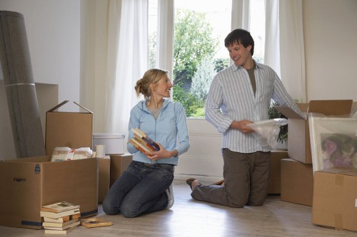 Organised moving boxes and packing materials in a North London flat