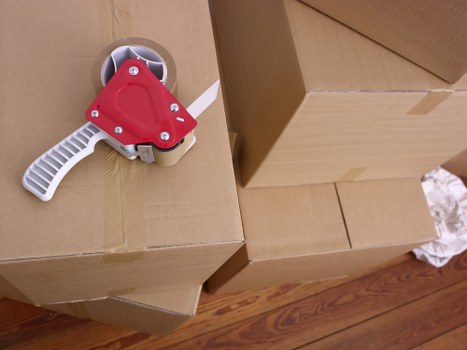 Careful loading of household items during a Finsbury Park relocation