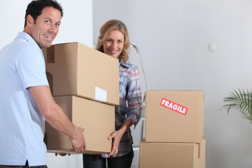 Professional removals team handling furniture in Finsbury Park